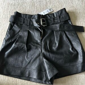 Top shop black leather shorts. Never worn.